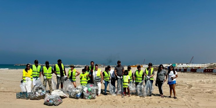 Intertek and Relocate MENA's Collaboration at the Clean Ocean Initiative Beach Clean-Up Team
